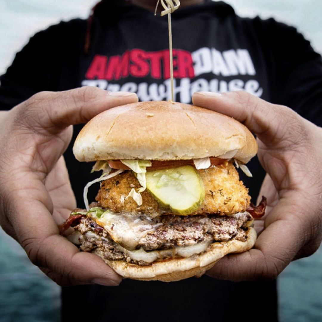 Appetising looking burger served at Toronto restaurant Amsterdam Brewhouse with own brewery and rooftop.