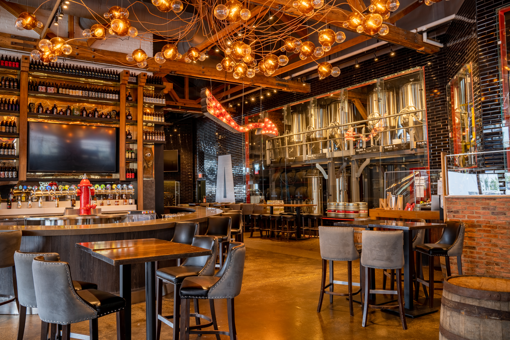 Inside view of Amsterdam Brewhouse showing the bar and seating options